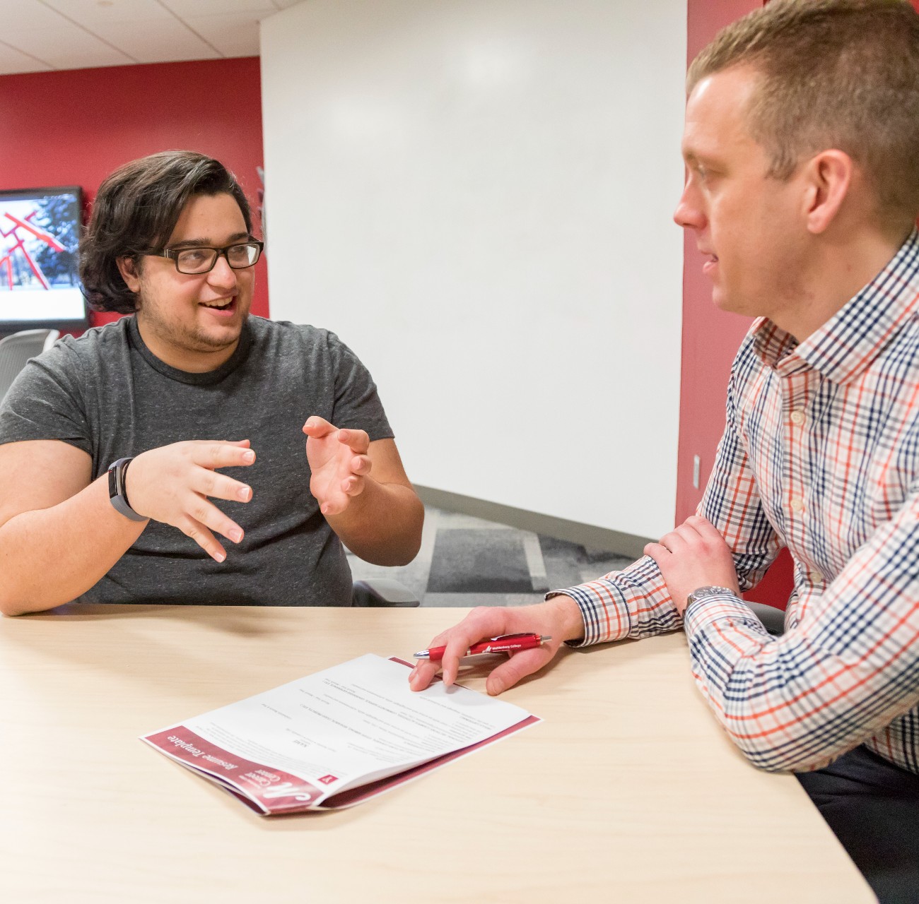 Career Center Director Ryan Smolko works with a student to find out more about their career plans.